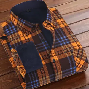 Warm men's long-sleeved fleece-lined plaid flannel shirt in orange and brown.