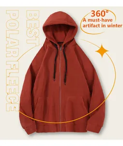 Detailed close-up view of a thick polar fleece hooded cardigan in burnt orange color.