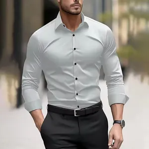 Detailed view of a men's white slim-fit long-sleeve dress shirt in four-way stretch