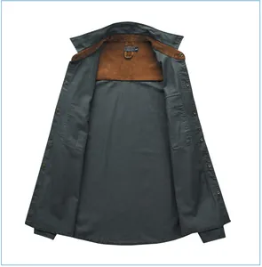 Men's cotton workwear shirt with contrast brown corduroy collar and loose fit detail.