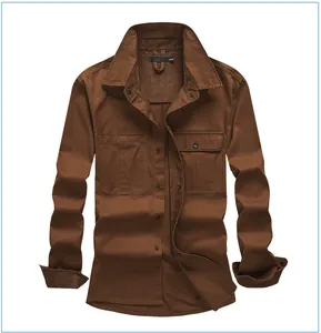 Detailed view of a brown corduroy long-sleeve workwear shirt with functional pockets