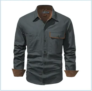 Detail view showing corduroy collar and cuffs on a grey cotton men's work shirt