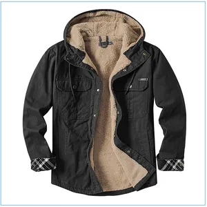 Detail view of men's black hooded jacket featuring warm tan Sherpa lining and plaid cuffs
