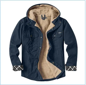Close-up detail of navy blue men's winter jacket with warm beige sherpa lining and hood.