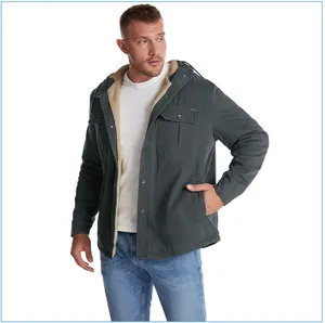 Detailed macro view showing the sherpa lining of this men's hooded winter jacket