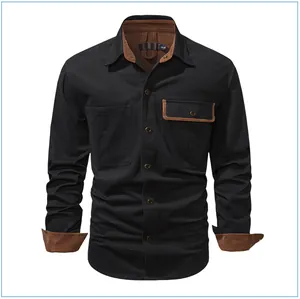 Detail view of black mens cotton work shirt with brown corduroy collar and cuffs accents.