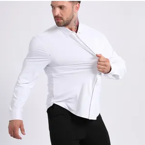 Close-up of white high-stretch long-sleeve men's shirt demonstrating fabric elasticity
