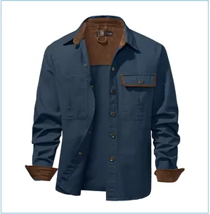 Detailed view of men's blue cotton work shirt with brown corduroy collar and cuffs