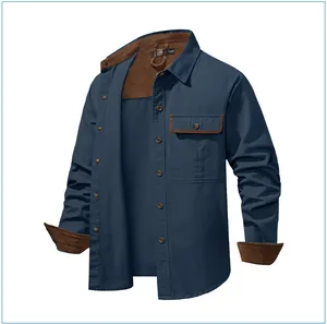 Detail view of men's cotton work shirt featuring corduroy contrast collar and cuffs in blue.