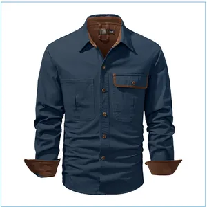 Front view detail of a navy blue men's cotton work shirt with brown corduroy trim