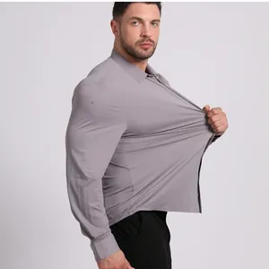 Close-up showing high elasticity and stretch of grey men's dress shirt fabric