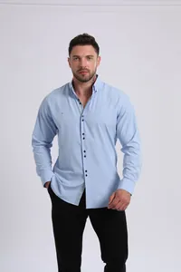 Business casual light blue long sleeve shirt for men with patterned collar detail