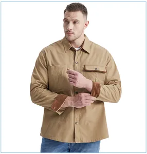 Detailed view of men's cotton work shirt with corduroy contrast cuffs and pockets