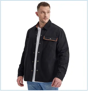 Model wearing men's black cotton work shirt with corduroy contrast trim details