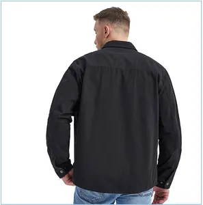 Back view of a black heavy cotton workwear shirt showing texture and stitching details