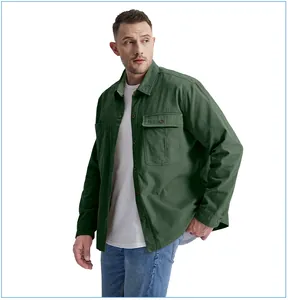 Professional male model wearing a dark green cotton corduroy utility shirt with dual pockets