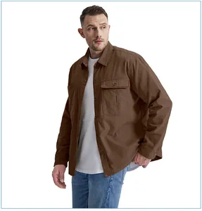 Detail of men's loose fit brown cotton work shirt featuring a contrast corduroy collar