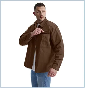 Detail view of men's brown corduroy work shirt with chest pocket and button flap