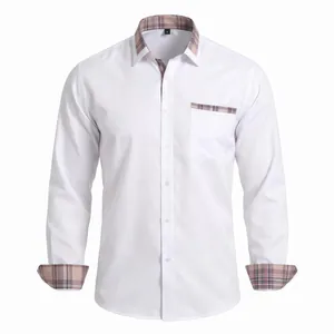 Détail d'une chemise blanche pour homme avec des accents à carreaux sur le col et les poignets