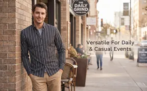Men's black and white striped long-sleeve shirt in a casual outdoor cafe setting.