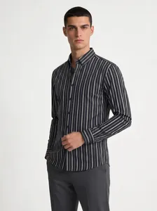 Detailed view of a men's vertical striped long-sleeved shirt featuring premium stretch fabric