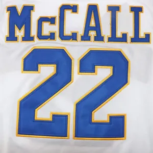 Close-up of embroidered McCall 22 on white vintage movie basketball jersey