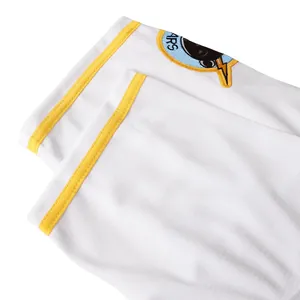 Detailed view of white baseball jersey sleeve embroidery and yellow stripe trim