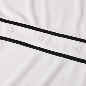 Close-up detail of white mesh baseball jersey with black stripes and white buttons