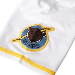 Detailed close-up view of the high-quality embroidered bear patch on a white movie version jersey