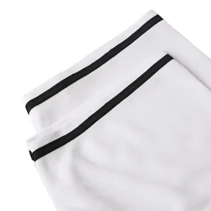 Macro view of high-quality white baseball jersey collar with black double stripe detail