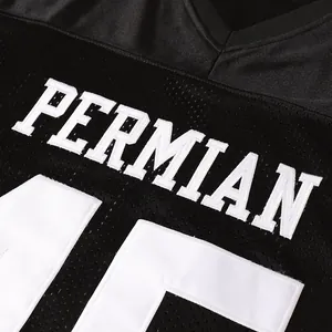 Close-up of white embroidered 'PERMIAN' and number 45 on black mesh football jersey