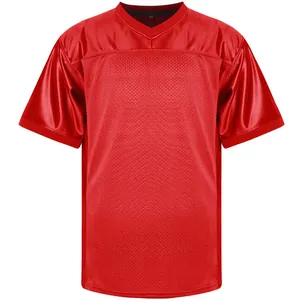 Detailed close-up showing the breathable red mesh fabric of a professional training jersey