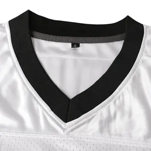 Close-up of the V-neck collar on a white mesh American football jersey with size tag.