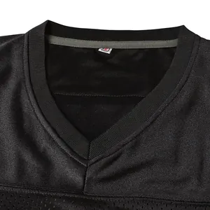 Close-up of a black American football jersey V-neck collar with mesh fabric detail