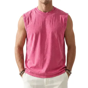 Macro detail of the washed distressed texture on a rose pink sleeveless cotton T-shirt
