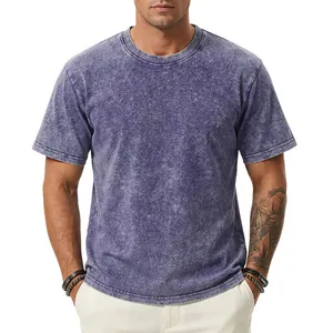 Detail showing the unique acid wash texture and heavy fabric of the vintage purple t-shirt.