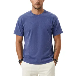 Detail of vintage washed heavyweight blue T-shirt showing distressed fabric texture.