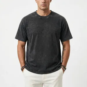 Detail view of men's loose fit 200g acid wash cotton t-shirt with vintage charcoal finish
