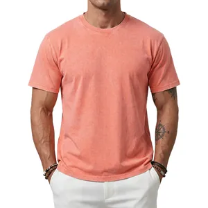 Detailed view of a men's 230g heavyweight acid-washed retro coral orange T-shirt texture