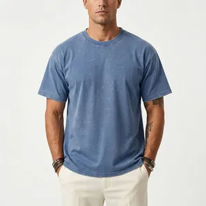 Close-up view of blue acid-wash men's T-shirt showing distressed fabric and texture
