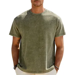 Detail of heavy 230g acid-washed vintage olive green t-shirt with drop shoulders