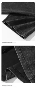 Detailed macro view of heavy-weight acid wash black t-shirt showing premium fabric texture