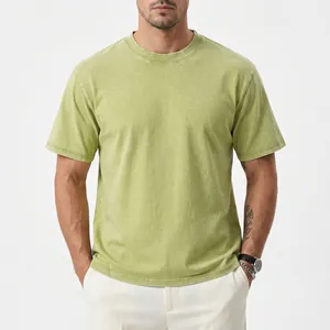 Front view detail of a heavyweight washed vintage cotton T-shirt in lime green.