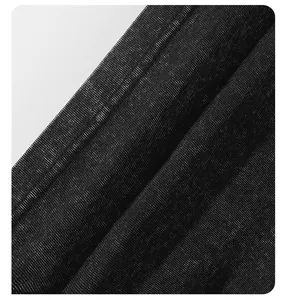 Detailed macro view of 230G vintage washed black cotton fabric texture and durable seams