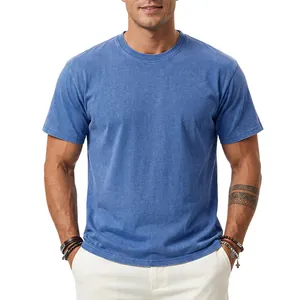 Close-up detail of a blue washed heavy cotton t-shirt featuring a vintage faded finish