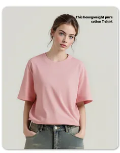 Model shot showing the loose fit and premium fabric of a pink heavy cotton T-shirt