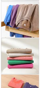Macro view showing the vintage texture and various colors of washed heavy cotton T-shirts