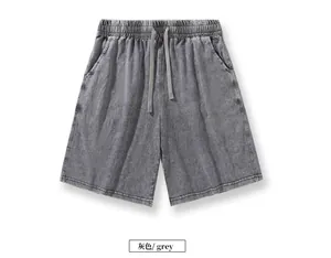 Front view of vintage washed grey cotton shorts with drawstring waist and relaxed fit