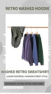 Gros plan sur le tissu délavé des sweats à capuche vintage en coton lourd
