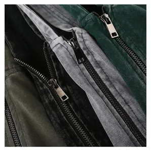 Close-up of vintage metal zippers on heavy washed distressed cotton zip-up hoodies